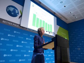 Organization for Economic Co-operation and Development (OECD) chief economist Catherine Mann speaks to present the OECD interim economic outlook "Global growth warning: weak trade, financial distortions" at the OECD headquarters in Paris on September 21, 2016.