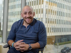 Kevin Hines, who previously attempted suicide by jumping off the Golden Gate Bridge and survived, is shown inside the offices at the Centre for Suicide Prevention in Calgary, Alta., on Monday, Sept. 12, 2016. Hines, now a globally awarded speaker and author, is in Calgary to speak to  University of Calgary students about his story. Elizabeth Cameron/Postmedia