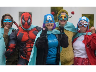The team known as Amanda's Avengers posed before  the Ovarian Cancer Walk of Hope at North Glenmore Park in Calgary, Alta., on Sunday, Sept. 11, 2016. Elizabeth Cameron/Postmedia