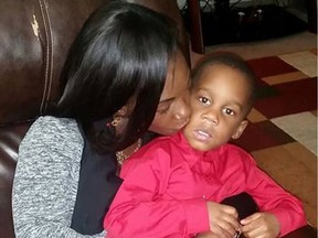 A Facebook photo  of Fatim Bamba and her young son Isaiah, Neighbours say the two  lived in the home on Ranchlands Grove, in the city's Northwest, Police were called to the home around 10 pm on January 30th, 2016 and found the four-year-old boy dead at the scene. FACEBOOK/Postmedia