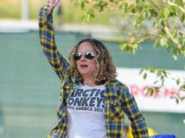 A fan jumps along to Atlas Genius' performance at X-Fest 2016 in Calgary, Alta., on Sunday, Sept. 4, 2016.