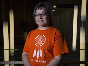 CALGARY, AB -- Phyllis Webstad, Indian Residential School Awareness Day keynote speaker and Orange Shirt day co-founder, poses for a photo in her orange shirt at Bow Valley College in Calgary, on September 27, 2016. Orange Shirt day developed out of Webstad having her new orange shirt taken away on her first day of school at the S. Joseph Mission residential school. --  (Crystal Schick/Postmedia) (For City story by  Valerie Fortney) 20076416A