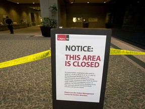 Access is blocked to the northeast area of City Hall in Calgary, Alta., on Monday, Sept. 19, 2016. This area remains closed more than a month later.
