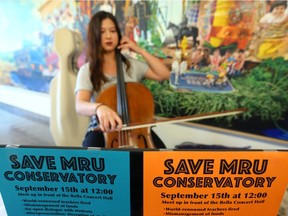 Amelia Sharp plays the cello in the foyer at Mount Royal University in Calgary, Alta on Thursday September 8, 2016. Sharp joined a handful of other MRU students are protesting the cancellation of two contracts in the music department, saying the world-renowned program will suffer greatly without their contributions.