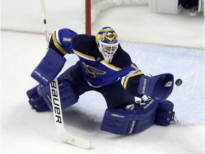 Brian Elliott makes a save during the second period in Game 2 of the NHL hockey Stanley Cup Western Conference finals against the San Jose Sharks, in St. Louis on May 17, 2016.