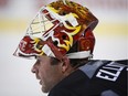 Calgary Flames goalie Brian Elliott catches his breath during an on-ice session on the second day of training camp in Calgary, Friday, Sept. 23, 2016.THE CANADIAN PRESS/Jeff McIntosh ORG XMIT: JMC114