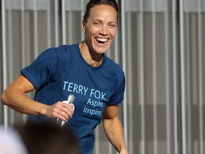 Olympic hurdler and pentathlete Jessica Zelinka warms up runners before the annual Terry Fox Run from Telus Spark on Sunday September 18, 2016. Gavin Young/Postmedia