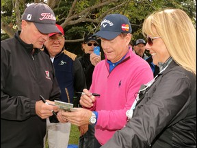 Tom Watson signs autographs after finishing the final round of the Shaw Charity Classic at the Canyon Meadows Golf Club in Calgary on Sunday September 4, 2016. Watson finished -6.