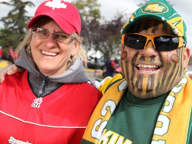 Yvonne Van Middelkoop smiles with Eddy Bawol before the CFL Labour Day Classic between the Calgary Stampeders and Edmonton Eskimos in Calgary on Monday September 5, 2016.