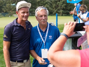 Champions league golfer Jesper Parnevik poses for a photo with a fan during the Shaw Classic RBC Championship ProAm event at the Canyon Meadows Golf Club on Wednesday August 31, 2016.