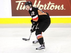 Hitmen Mark Kastelic looks for a pass as the Calgary Hitmen hosted the Medicine Hat Tigers in Western Hockey League action.