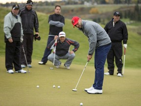 Calgary Flames captain Mark Giordano putts during the Calgary Flames Celebrity Charity Golf Classic at Country Hills Golf Club in Calgary, Alta., on Tuesday, Sept. 20, 2016. The two-day, two-course (the other is the Hamptons Golf Club) annual tournament benefits the Calgary Flames Foundation. Lyle Aspinall/Postmedia Network