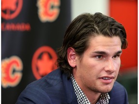 Sean Monahan speaks to members of the media at the Scotiabank Saddledome in Calgary, Alta. on Friday August 19, 2016, following his Calgary Flames seven year contract extension.