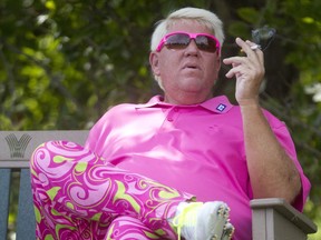 John Daly relaxes on the tee box while waiting his turn to drive during the RBC Championship Pro-Am in the Shaw Charity Classic at Canyon Meadows Golf Club Thursday September 1, 2016.  (Ted Rhodes/Postmedia)