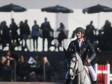 Nicola Philippaerts of Belgium rides in front of the lounge area of the International Ring Terrace at Spruce Meadows during the Friends of the Meadow Cup during The Masters Friday evening September 9, 2016.