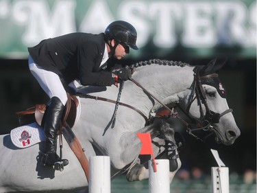 Eric Lamaze rides Houston in the Friends of the Meadow Cup during The Masters at Spruce Meadows Friday evening September 9, 2016.