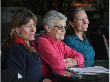 Longtime Spruce Meadows fans from the USA, from the left, Tracy Ambrico, mom Patti Smith, and sister Shelley Smith, take in morning events on the All Canada Ring during The Masters Thursday September 8, 2016. Tracy is from Austin, Texas, Shelley from Anchorage and mom from Seal Beach, California.