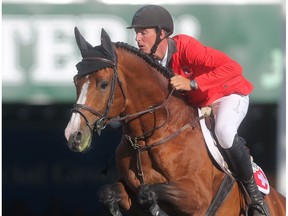 Alain Jufer of Switzerland rides Wiveau M in the jump off, posting a clean run to seal the  Swiss team's victory in the BMO Nation's Cup Saturday September 10, 2016 during The Masters at Spruce Meadows.