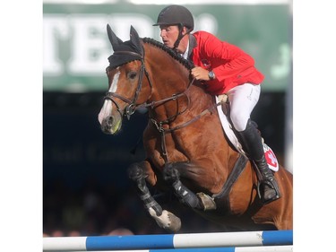 Alain Jufer of Switzerland rides Wiveau M in the jump off, posting a clean run to seal the  Swiss team's victory in the BMO Nation's Cup Saturday September 10, 2016 during The Masters at Spruce Meadows.