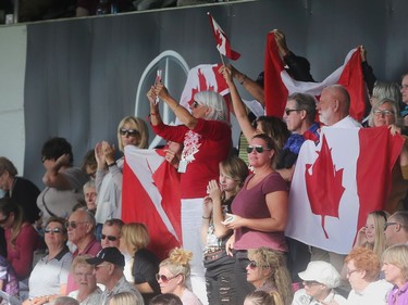 Fans cheer on Canadian rider Eric Lamaze in the BMO Nation's Cup Saturday September 10, 2016 during The Masters at Spruce Meadows. Team Canada took home the bronze medal.