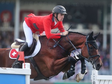 Steve Guerat of Switzerland rides Corbinian during the Swiss team's victory in the BMO Nation's Cup Saturday September 10, 2016 during The Masters at Spruce Meadows.