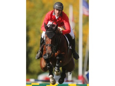 Steve Guerat of Switzerland rides Corbinian during the Swiss team's victory in the BMO Nation's Cup Saturday September 10, 2016 during The Masters at Spruce Meadows.