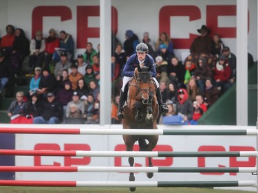 British rider Scott Brash clears a fence on his way to victory in the CP International Grand Prix, and it's $1million paycheque, Sunday September 11, 2016 on the final day of the Spruce Meadows Masters.