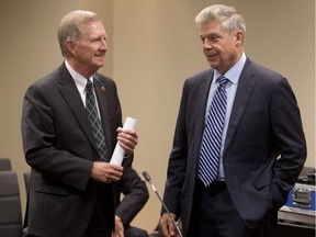 Neil Wittmann, chief justice of the Court of Queen's Bench of Alberta, chats with Senator Bob Runciman Wednesday September 28, 2016 prior to the senate committee hearings on judicial vacancies at the Calgary Marriott. (Ted Rhodes/Postmedia Calgary)