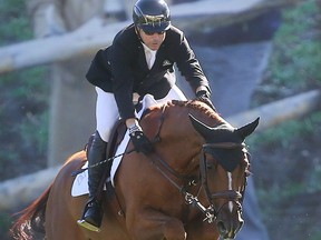Canada's Eric Lamaze rides Chacco Kid to second place in the Telus Cup Wednesday September 7, 2016 on the opening day of The Masters at Spruce Meadows. (Ted Rhodes/Postmedia)