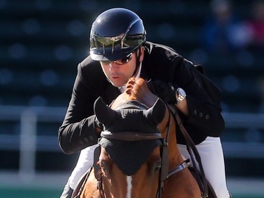 Canada's Eric Lamaze rides Chacco Kid to second place in the Telus Cup Wednesday September 7, 2016 on the opening day of the Masters at Spruce Meadows.
