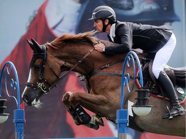 Steve Guerdat of Switzerland rides Corbinian to victory in the Telus Cup Wednesday September 7, 2016 on the opening day of The Masters at Spruce Meadows.