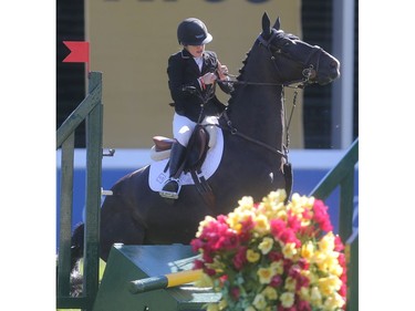 Canadian Kara Chad has to pull up on her horse Gin Tonic after banging into a rail during the Telus Cup Wednesday September 7, 2016 on the opening day of The Masters at Spruce Meadows.