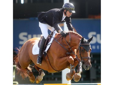 Canada's Eric Lamaze rides Chacco Kid to second place in the Telus Cup Wednesday September 7, 2016 on the opening day of The Masters at Spruce Meadows.