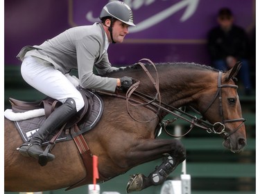 Philipp Weishaupt of Germany rides Catokia 2 in the jump off at the ATCO Founders Classic at Spruce Meadows during The Masters Thursday  September 8, 2016.
