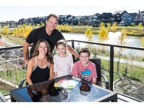 Chantel and Jeff Hodgson with children Jovie and Jack at their new home in King's Heights in Airdrie.