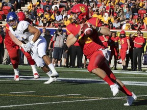 CALGARY, AB -- The U of C Dino's quarterback Jimmy Underdahl makes a pass during game action against UBC at McMahon Stadium in Calgary, on September 9, 2016. --  (Crystal Schick/Postmedia) (For Sports story by  Rita Mingo)