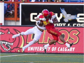 The U of C Dino's Denzel Radford is left just yards short of the goal line after running nearly the entire field during game action against UBC at McMahon Stadium in Calgary, on September 9, 2016.