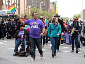 Mayor Naheed Nenshi marches in last year's Pride Parade. This year's parade goes on Sunday.