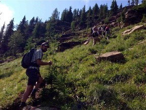 Hikers head up to Akamina Ridge in August 2014. A hiker was attacked by a grizzly bear in the same area Sunday.