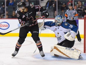 Goaltender from the Kootenay Ice Payton Lee blocks a shot from the Calgary Hitmen during the regular season home opener at the Scotiabank Saddledome in Calgary, Alta., on Friday, Sept. 23, 2016.