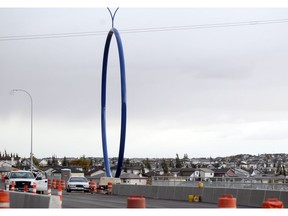 Local Input~ Colleen De Neve/ Calgary Herald CALGARY, AB --OCTOBER 8, 2013 -- The Blue Ring public art project on the 96th Avenue connection to Airport Trail was photographed on October 8, 2013. (Colleen De Neve/Calgary Herald) (For City story by Val Fortney) 00049020A SLUG: BLUE RING ORG XMIT: POS2013100818575706
