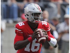 FILE - In this Sept. 3, 2016, file photo, Ohio State quarterback J.T. Barrett plays against Bowling Green during an NCAA college football game, in Columbus, Ohio. Tulsa will be a huge underdog at no. 4 Ohio State on Saturday.