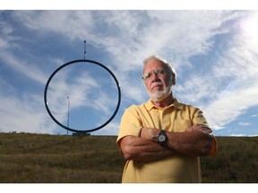John Chandler poses near the Travelling Light public art display near Airport Tr and Deerfoot Tr in Calgary, Alta on Friday September 23, 2016. Jim Wells//Postmedia