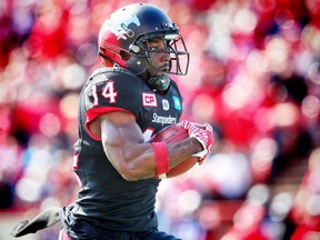 Calgary Stampeders Roy Finch returns a kick off for a touchdown against the Edmonton Eskimos during CFL football in Calgary, Alta., on Monday, September 5, 2016. AL CHAREST/POSTMEDIA