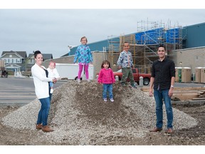 Crystal and Allan Huck with their children, Lexus, 6, Bentley, 4, Paisley, 2, and Aria, eight months in Auburn Bay.