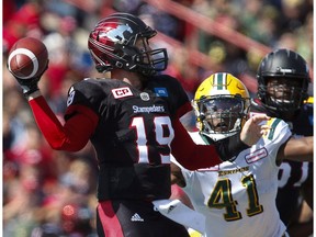FILE - Phillip Hunt and Odell Willis terrorized quarterbacks as bookends with the Winnipeg Blue Bombers and while they'll be reunited in Edmonton for the Eskimos Saturday rematch with the Calgary Stampeders, Swaggerville is not moving west. Willis, right, closes in on Calgary Stampeders quarterback Bo Levi Mitchell during first half CFL football action in Calgary in a Sept. 5, 2016, file photo.