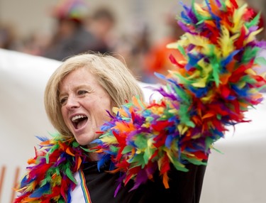 Premier Rachel Notley walks in the Calgary Pride Parade in the city's downtown core on Sunday, Sept. 4, 2016. About 60,000 people were expected to watch the annual parade, as more than 125 entries took part. Lyle Aspinall/Postmedia Network