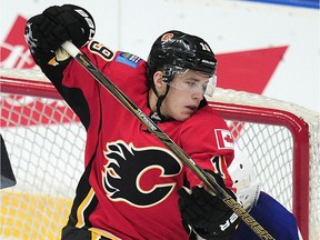 Calgary Flames' Matthew Tkachuk (19) in the crease in front of  Edmonton Oilers' goalie Dylan Wells (30) during second period 2016 NHL Young Stars Classic action at the South Okanagan Events Centre in Penticton, BC., September 17, 2016.