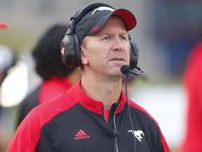 Calgary Stampeders  head coach Dave Dickenson looks on from the sideline during CFL football in Calgary, Alta., on Sunday, August 28, 2016.