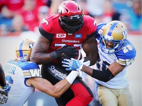 Calgary Stampeders Jerome Messam with a  touchdown against the Winnipeg Blue Bombers during CFL football in Calgary on September 23, 2016.